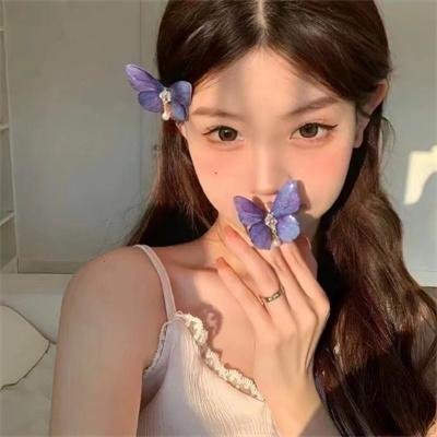 桃花含露又春风